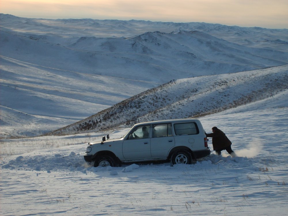 car-sunk-snow-mongolia.jpg