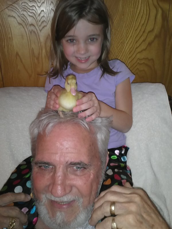 duck on Papaws head.jpg