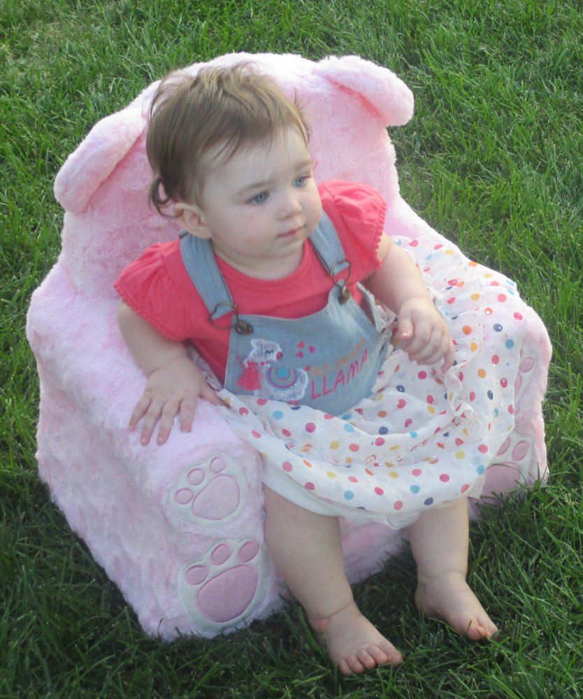 Evelyn in chair cropped.jpg