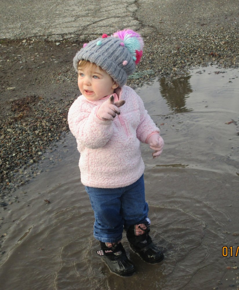 Evelyn in puddle.jpg