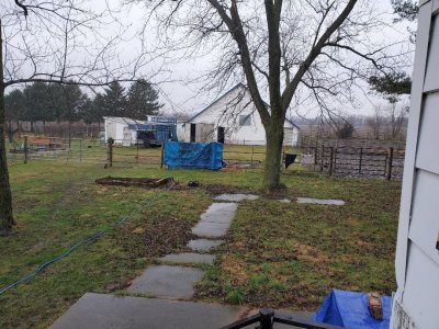 Barn, cleaning the tarp and towels, winter, 2022.jpg