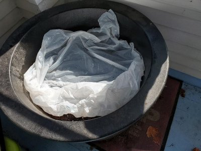 Whiskey barrel planter on porch, 02-15-23, #1.jpg