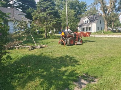 Derechio, July cleanup, Tractor #4.jpg